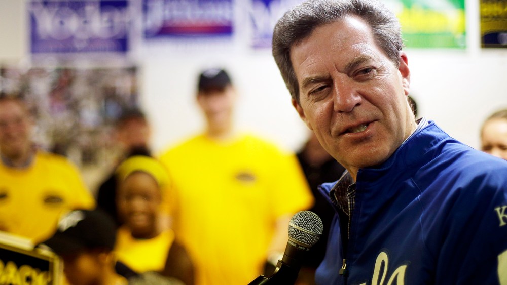 Kansas Republican Gov. Sam Brownback talks to supporters during a campaign event on Nov. 1, 2014, in Topeka, Kan.