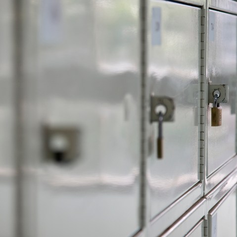 Close up of a row of school lockers. (Photo by GS/Gallery Stock)