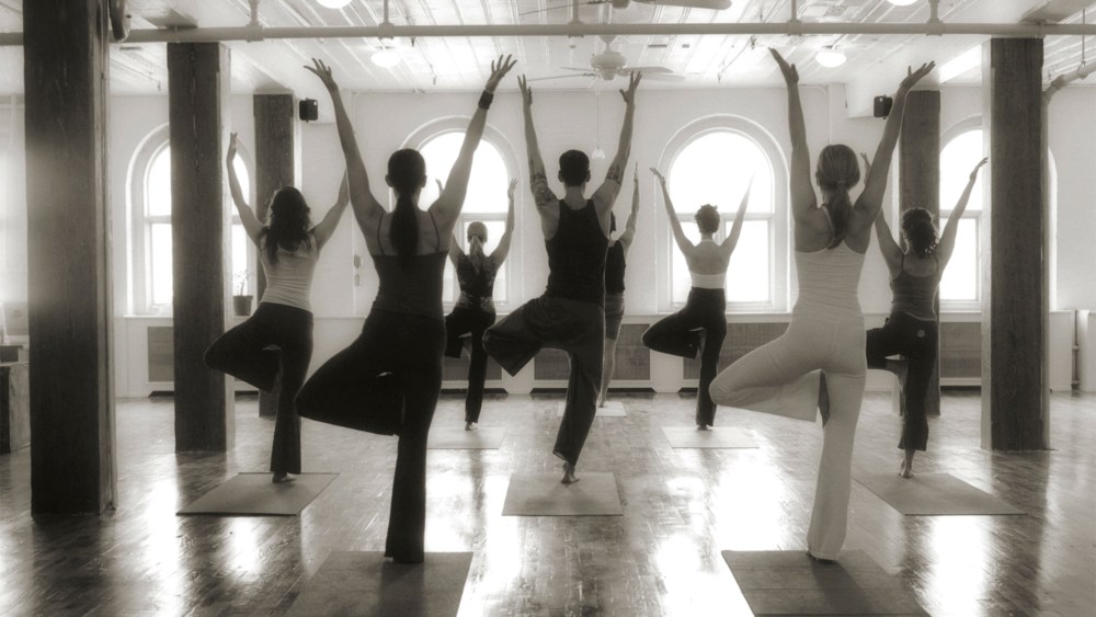 A yoga class. (Photo by Sally Gall/Gallery Stock)