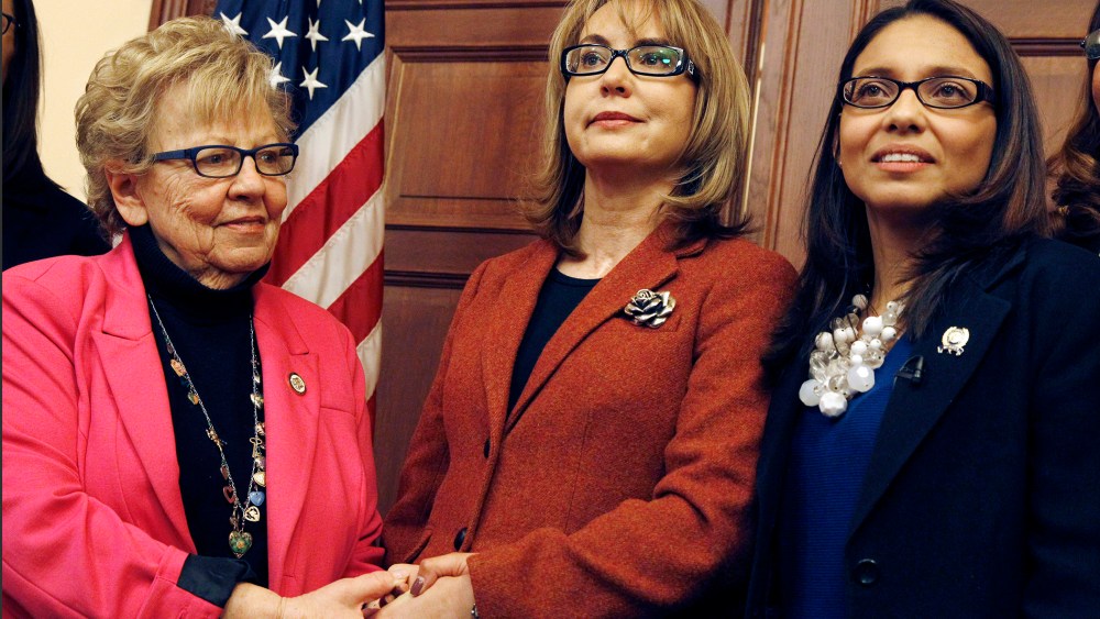 Former U.S. Rep. Gabrielle Giffords, center, of Arizona, poses for photographs with New Jersey Assemblywoman Gabriela Mosquera, right, D-Turnersville, N.J., and state Sen. Loretta Weinberg, left, D-Teaneck, N.J., after a meeting on March 18, 2015.