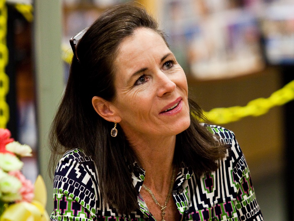 File Photo: Jenny Sanford, former wife of South Carolina Governor Mark Sanford, signs copies of her book "Staying True" at a bookstore February 13, 2010 in Mt. Pleasant, South Carolina. (Photo Richard Ellis/Getty Images/File)