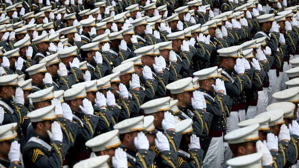 The 2010 graduating class of the United States Military Academy at West Point salutes President Back Obama as he is about to walk on stage during graduation ceremonies on May 22, 2010 in West Point, New York. (Photo by Michael Nagle/Getty Images)