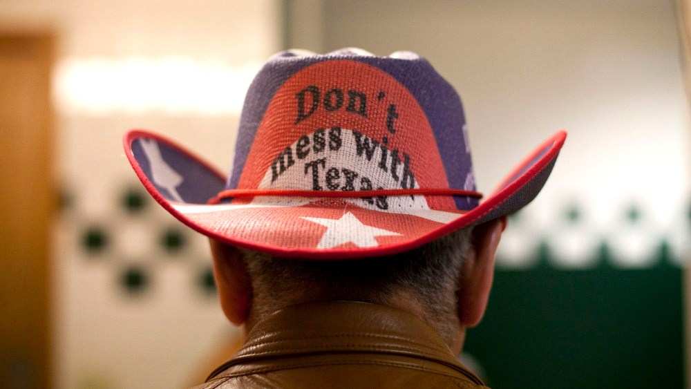 File Photo: Conservative supporters gather at the Victory Texas and Republican Party of Texas election night watch party for Republican Gov. Rick Perry, at the Texas Disposal Systems Exotic Game Ranch on November 2, 2010 in Buda, Texas. Gov. (Photo by...