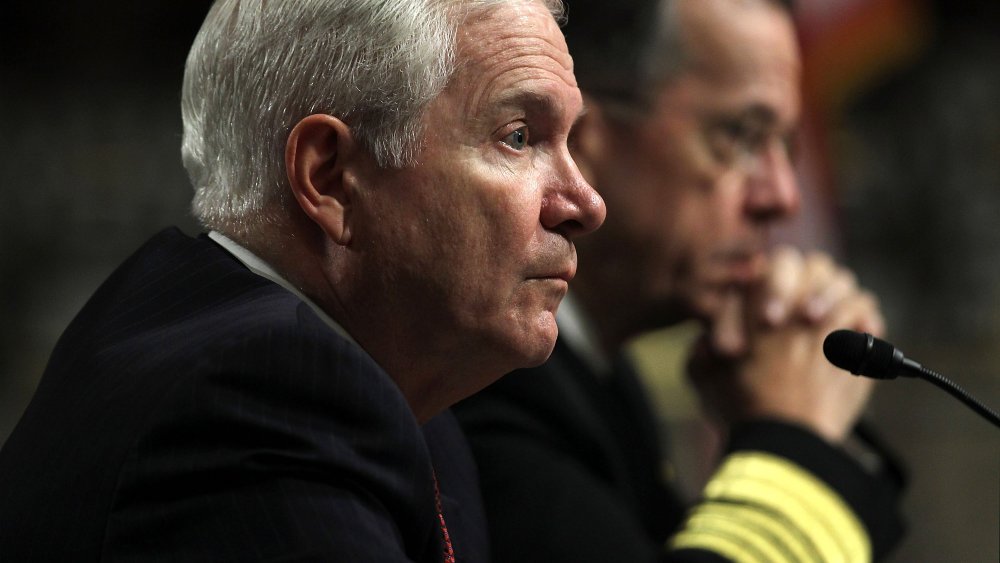 U.S. Secretary of Defense Robert Gates (L) and Chairman of the Joint Chiefs of Staff Admiral Mike Mullen (R) testify during a hearing before the Senate Armed Services Committee March 31, 2011 on Capitol Hill in Washington, DC. The hearing was to...
