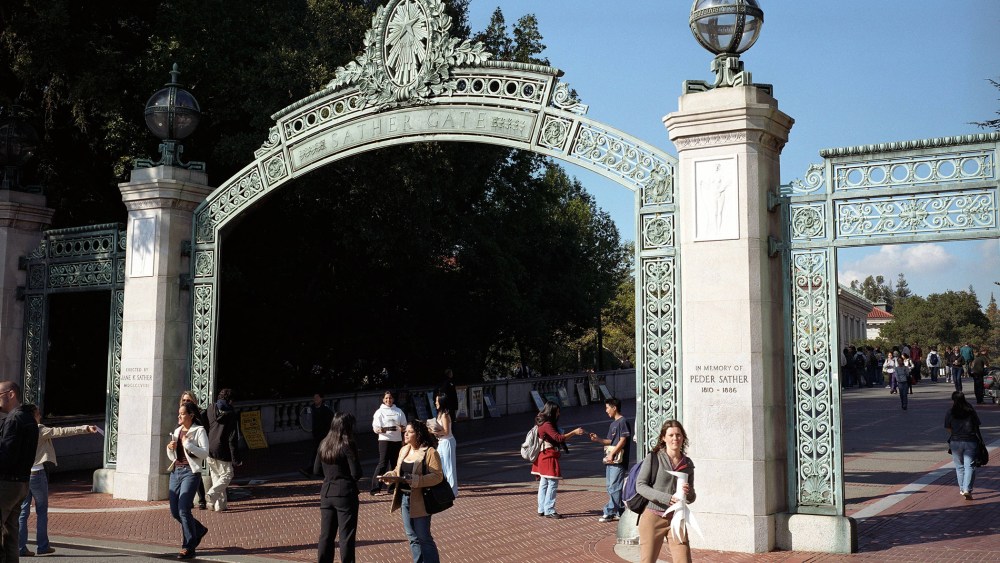 Students walk through the Sather Gate on the University of California, Berkeley campus in Berkeley, Calif.