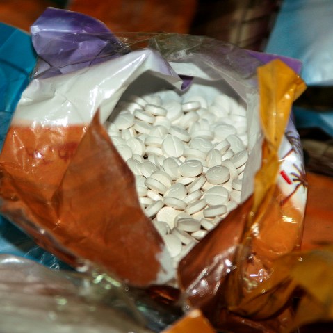 Bags containing pills called Captagon were found in a Beirut port on Nov. 26, 2007. (Photo by Nabil Mounzer/EPA)