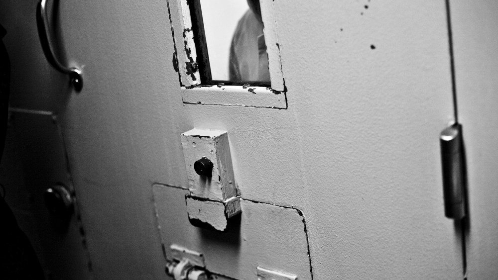 A teen in solitary confinement at Illinois Youth Center in St. Charles, Ill.
