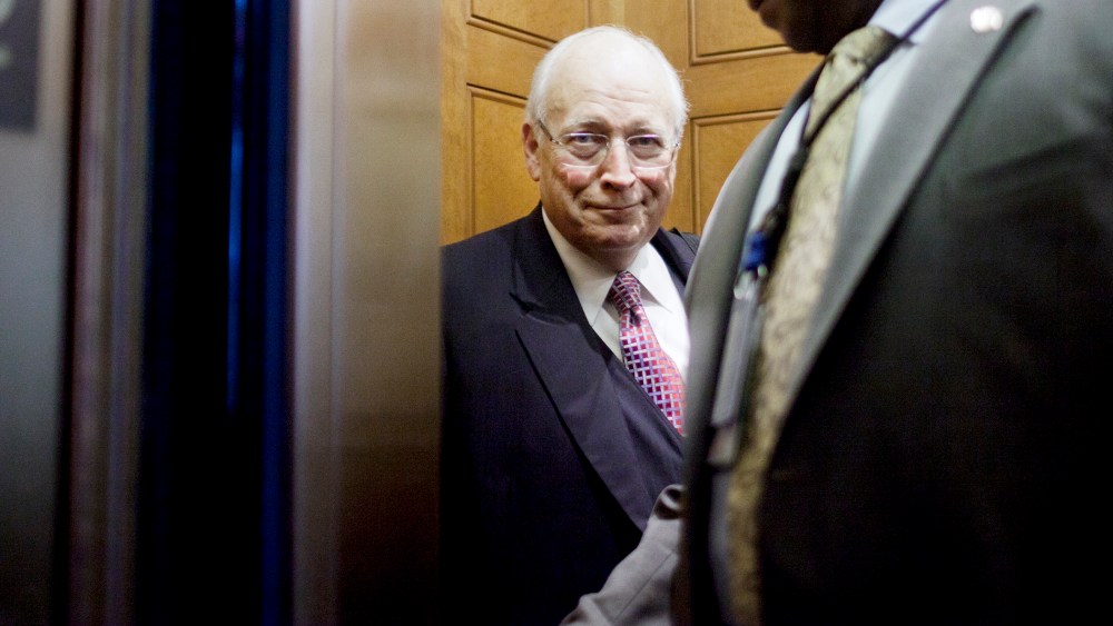 Former Vice President Dick Cheney boards an elevator at the U.S. Capitol.