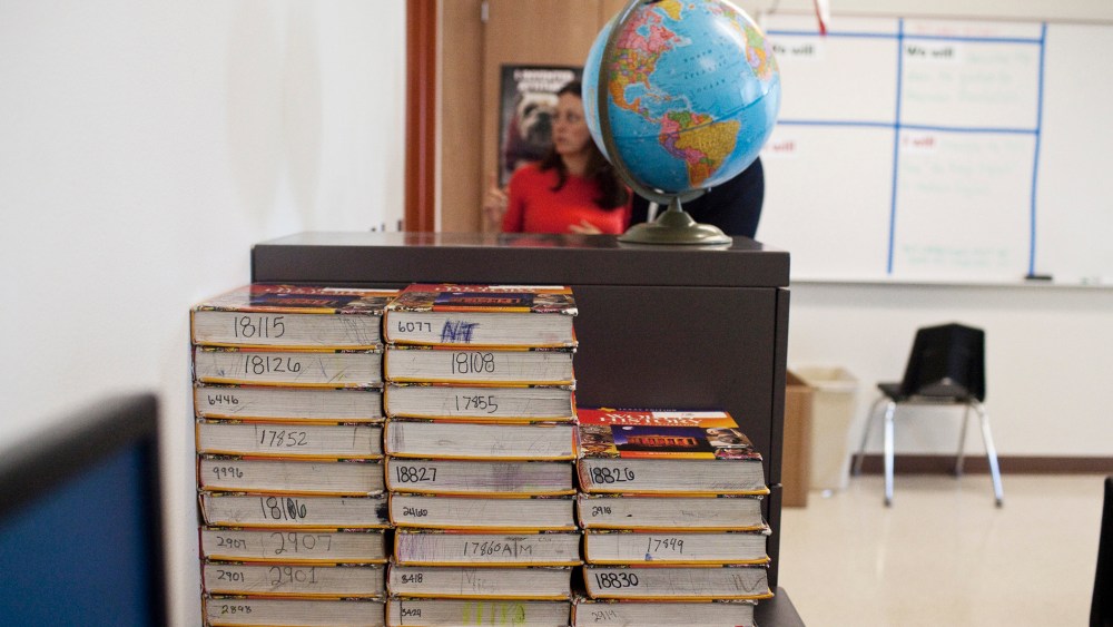 Textbooks, which are assigned and shared, in a classroom at Hutto High School in Hutto, Texas.