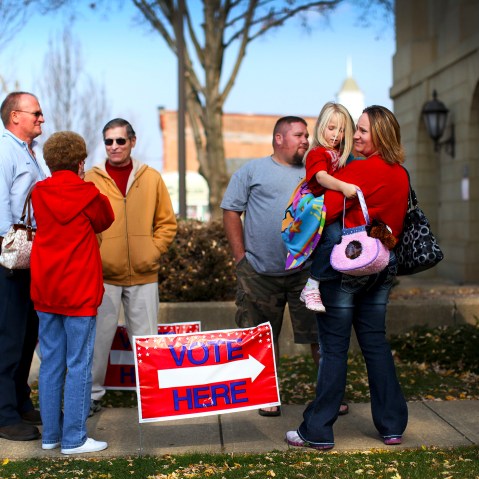 Voters line up at the Board of Elections office to cast their early ballots in New Philadelphia, Ohio, Oct. 26, 2012.