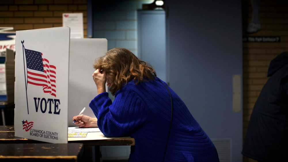 Deborah Carr, votes before heading to work a night shift, in Cleveland, Ohio on Nov. 6, 2012.