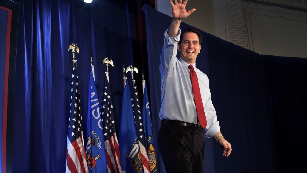 Wisconsin Governor Scott Walker greets supporters at an election-night rally in Waukesha, Wisconsin, June, 2012.