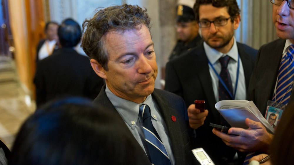 Sen. Rand Paul speaks to reporters at the Capitol, Sept. 25, 2013.