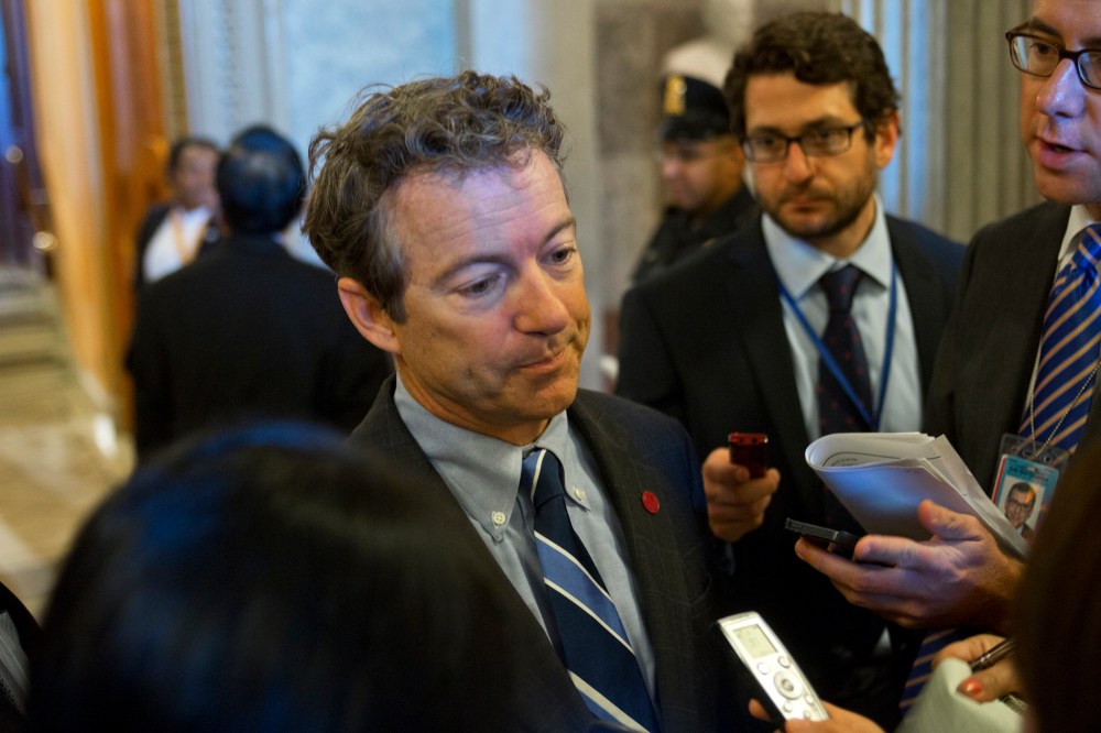 Sen. Rand Paul speaks to reporters at the Capitol, Sept. 25, 2013.