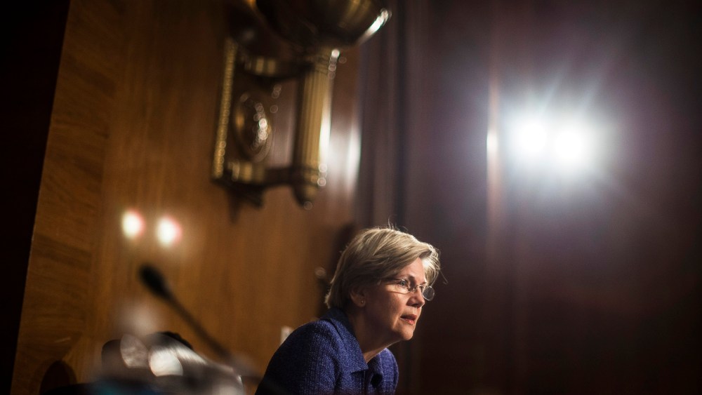 Sen. Elizabeth Warren (D-Mass.) speaks during a hearing on Capitol Hill in Washington, D.C., Nov. 12, 2013. (Photo by Gabriella Demczuk/The New York Times/Redux)