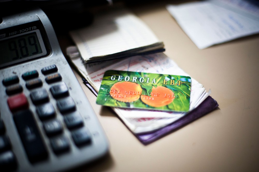 An electronic benefit card for Georgia's food stamp program sits on the counter of Shinholster Grocery & Meat in Irwinton, Ga., Nov. 21, 2013.