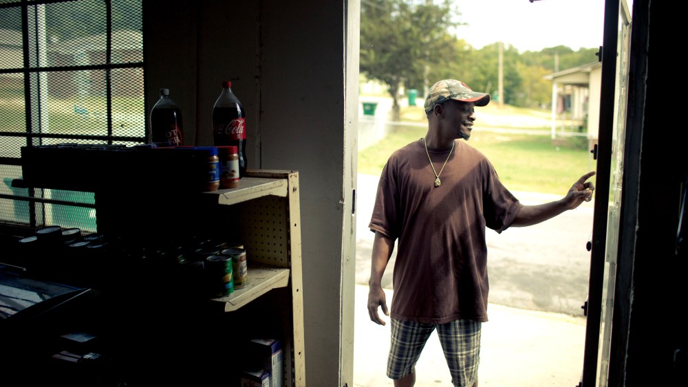 Curtis Parks stands outside The Corner Store, which he runs, on Hackett St. in Greenwood, S.C. on Sept. 28, 2012.