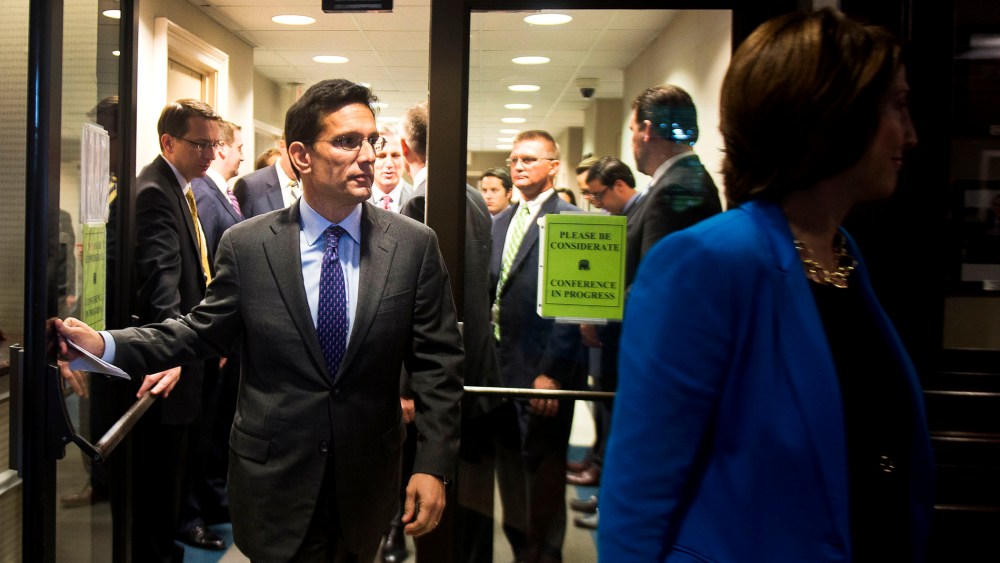Eric Cantor enters a news conference at the Republican National Committee headquarters in Washington, Oct. 23, 2013.