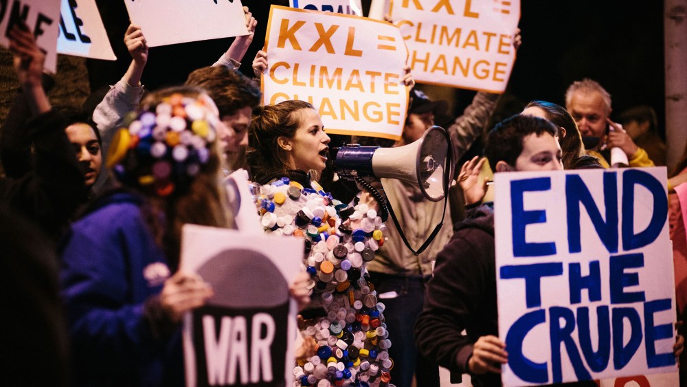 Protestors urge President Obama to reject the Keystone KXL Pipeline in Santa Monica, Calif. on Feb. 3, 2014. (Photo by Laura Kleinhenz/Redux)