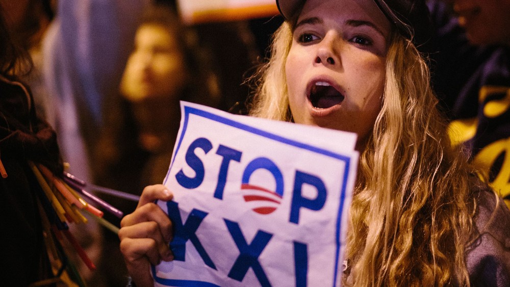 Protestors in Santa Monica urge President Obama to reject the Keystone KXL Pipeline, Feb. 3, 2014.
