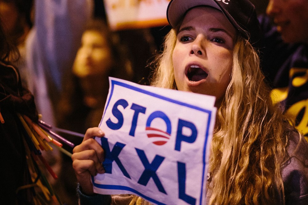 Protestors in Santa Monica urge President Obama to reject the Keystone KXL Pipeline, Feb. 3, 2014.