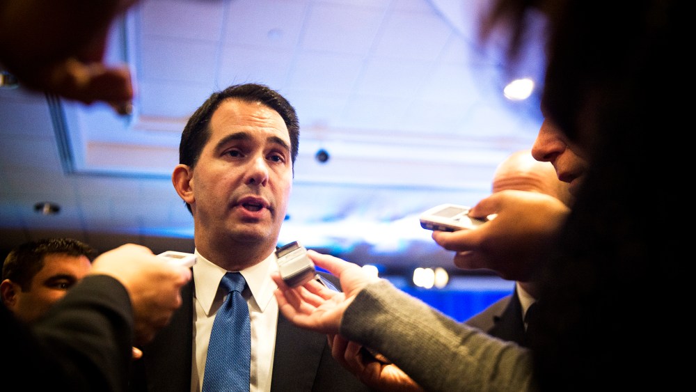 Wisconsin Gov. Scott Walker speaks to the reporters in Washington, D.C., Feb. 22, 2014.