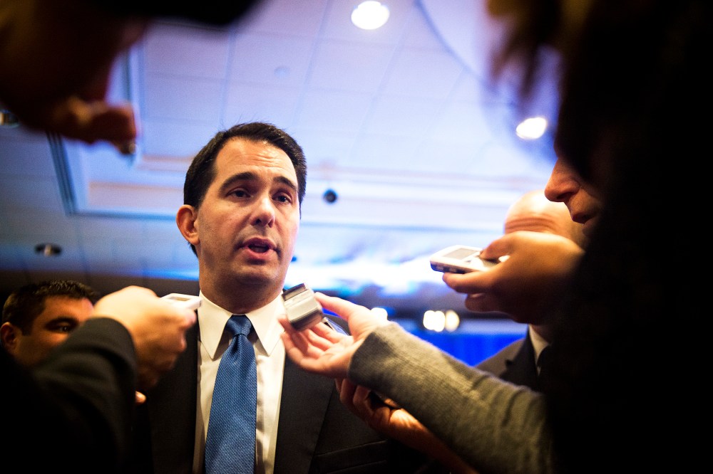 Wisconsin Gov. Scott Walker speaks to the reporters in Washington, D.C., Feb. 22, 2014.
