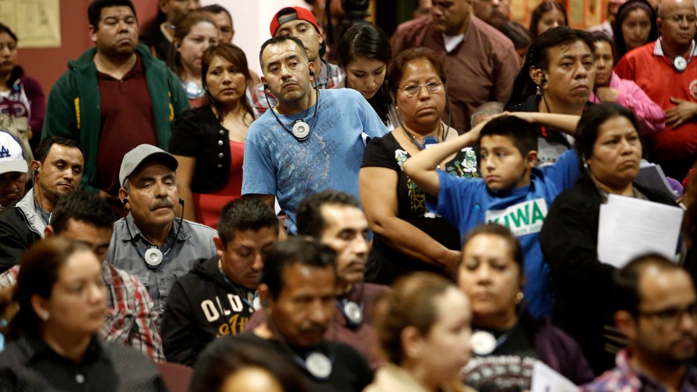 Attendees at a workshop on a new law that allows undocumented immigrants to get driver's licenses, at the Bell Community Center in Bell, Calif.