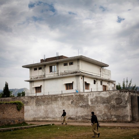 A Pakistani police guard the compound where Osama Bin Laden was killed in an operation by US Navy Seals, on May 4, 2011, in Abottabad, Pakistan.