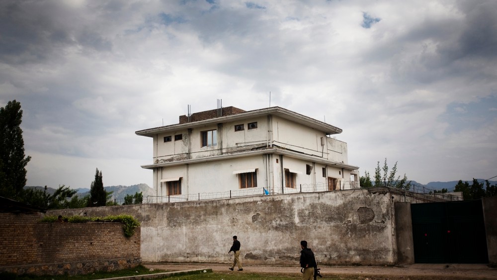 A Pakistani police guard the compound where Osama Bin Laden was killed in an operation by US Navy Seals, on May 4, 2011, in Abottabad, Pakistan.