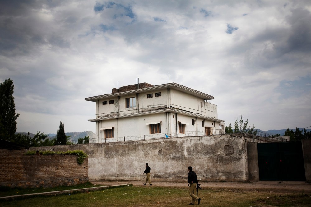 A Pakistani police guard the compound where Osama Bin Laden was killed in an operation by US Navy Seals, on May 4, 2011, in Abottabad, Pakistan.