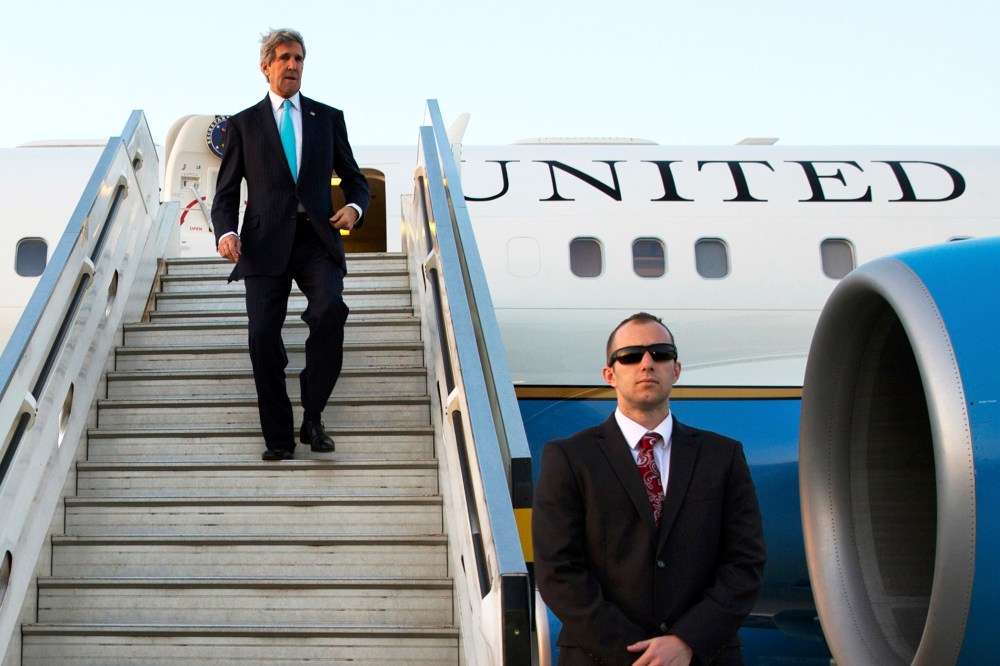 U.S. Secretary of State John Kerry disembarks from his plane, March 31, 2014.