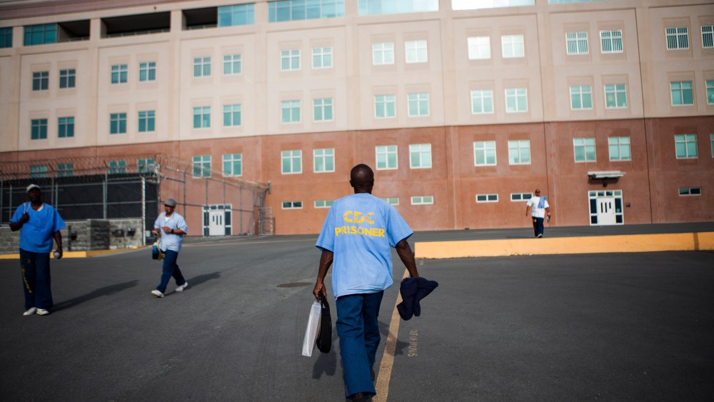 A prisoner returns to his cell at San Quentin State Prison in San Quentin, Calif., on April 30, 2014.