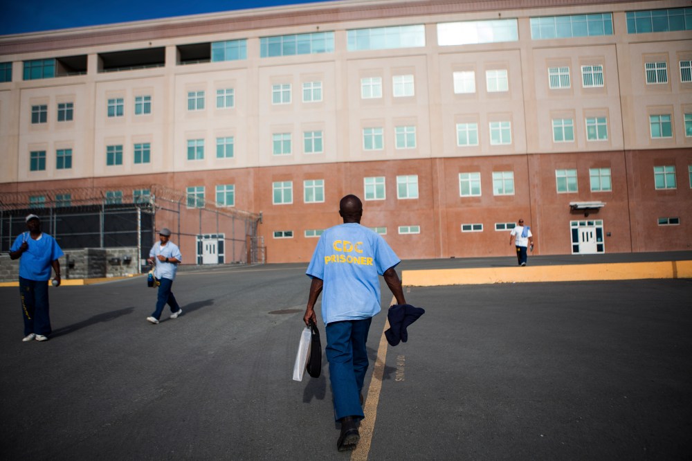 A prisoner returns to his cell at San Quentin State Prison in San Quentin, Calif., on April 30, 2014.