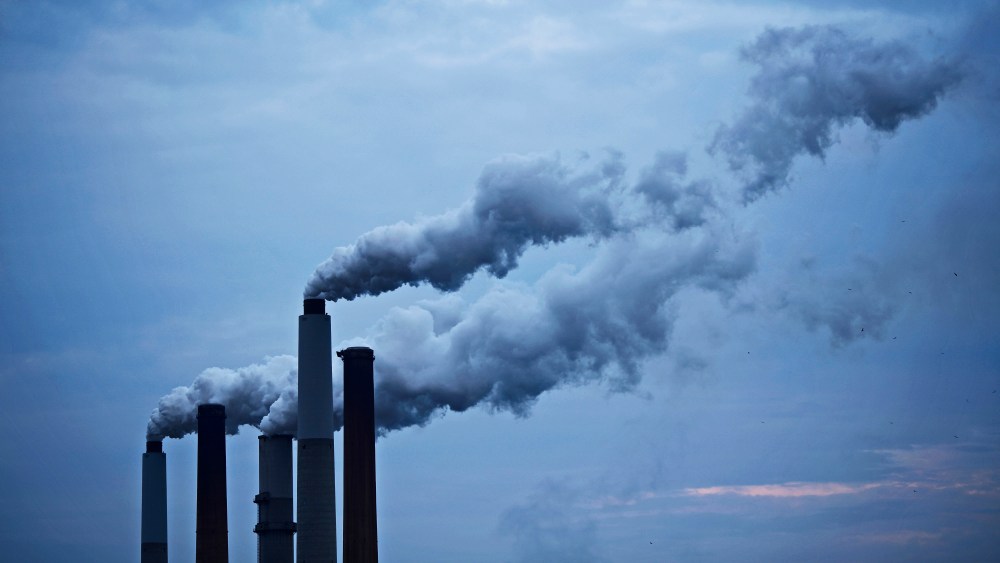 Emissions from a coal-fired power plant drift skyward in Ghent, Ky., June 2, 2014.