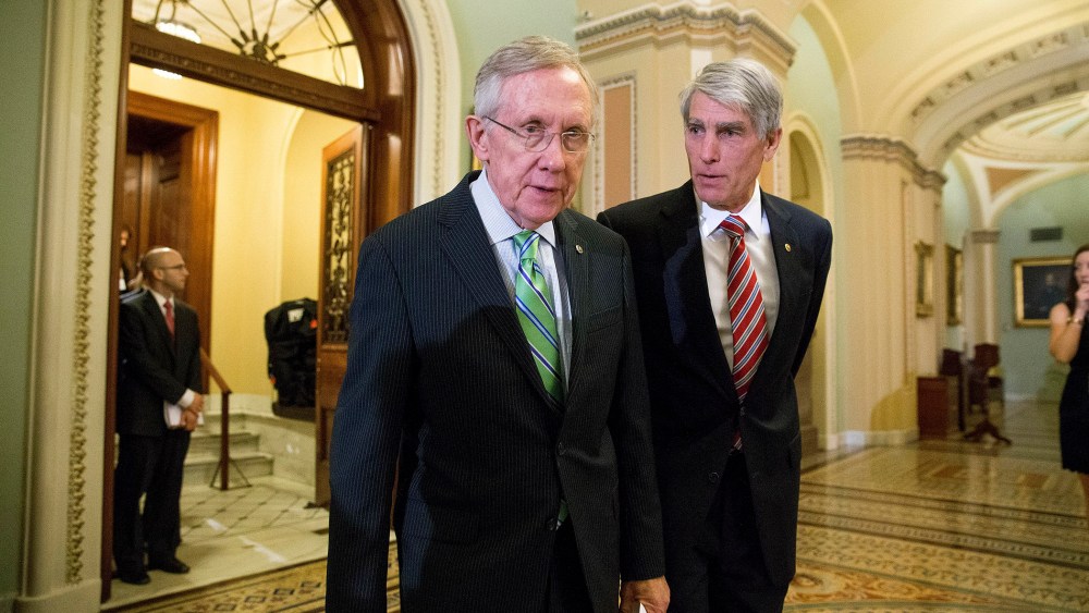 Sens. Harry Reid (D-Nev.) and Mark Udall (D-Colo) on Capitol Hill in Washington