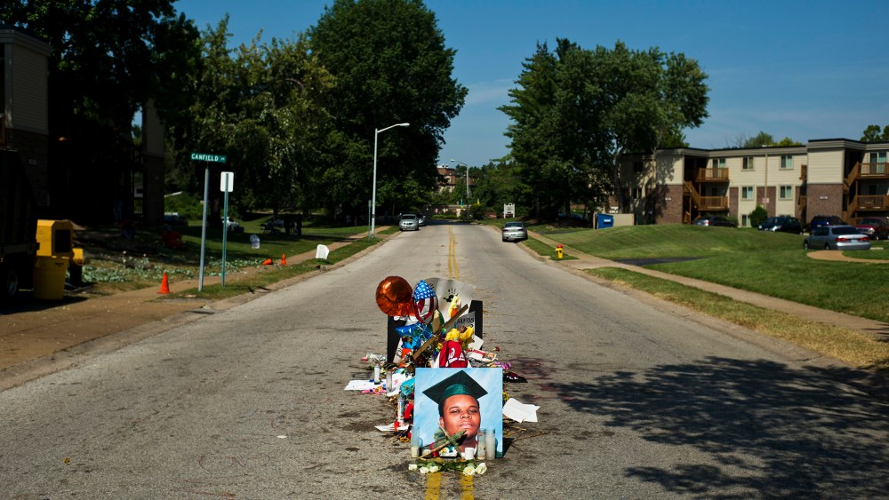 A makeshift memorial for Michael Brown, who was fatally shot by a police officer on Aug. 9, on the spot where he was killed in Ferguson, Mo., Aug. 26, 2014.