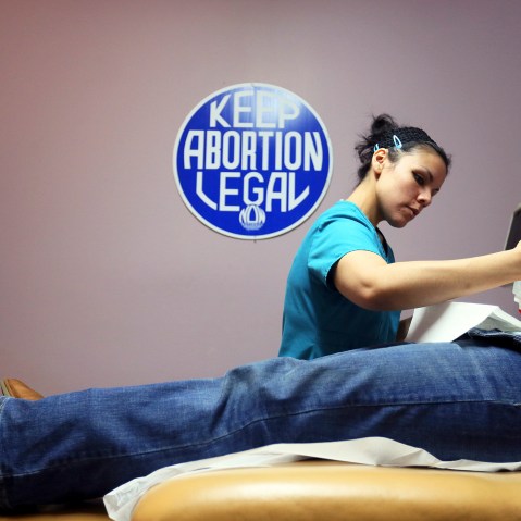 Nyla Munoz performs a sonogram for a walk-in patient at the Whole Women's Health Clinic in McAllen, Texas on March 4, 2014.