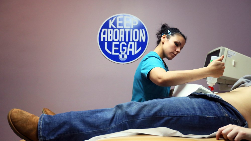 Nyla Munoz performs a sonogram for a walk-in patient at the Whole Women's Health Clinic in McAllen, Texas on March 4, 2014.