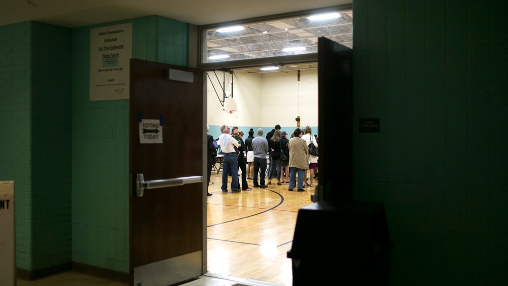 In the early morning hours, voters wait in line to cast ballots at a polling station in Schiller Park Recreation Center in Columbus, Ohio, March 15, 2016. (Photo by Maddie McGarvey/The New York Times/Redux)