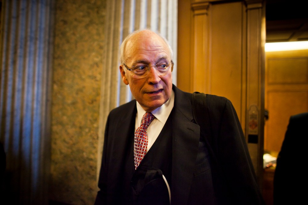 Former Vice President Dick Cheney walks out of a Republican Senate luncheon, Nov. 2011.