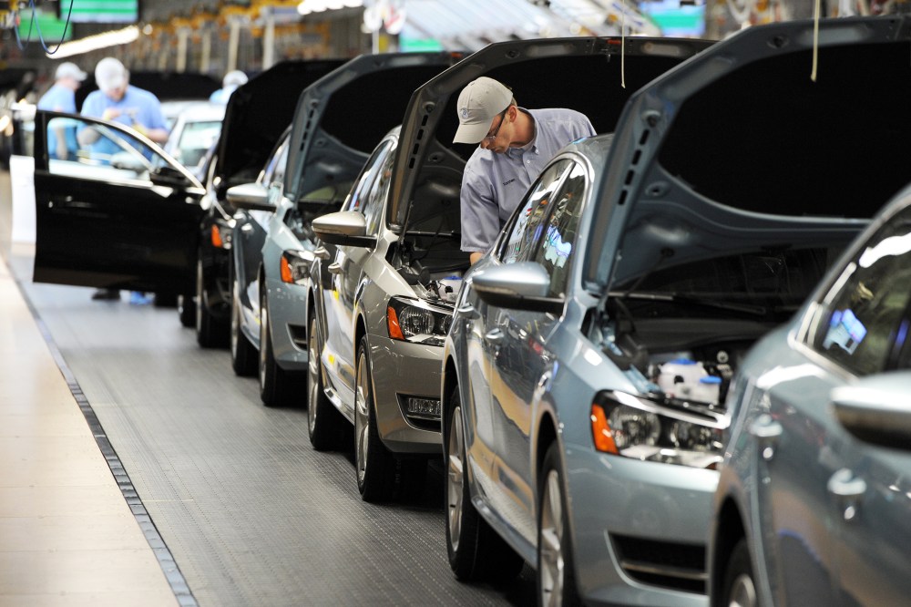 Passat sedans come off the assembly line at the Volkswagen automobile assembly plant, Feb. 21, 2012, in Chattanooga, Tenn.