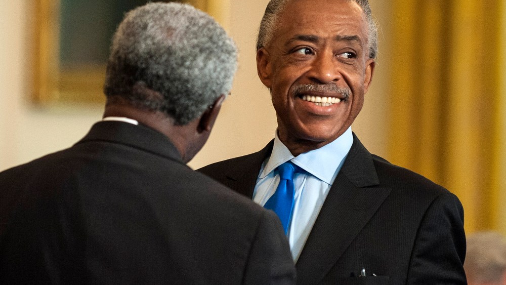 Rev. Al Sharpton (R) greets another participant during an Easter Prayer Breakfast at the White House in Washington DC, USA, 04 April 2012.