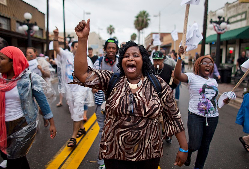 Protestors against voter suppression march on what was supposed to be the opening day of the Republican National Convention in Ybor City, Florida, on August 27, 2012. (Photo by Jim Lo Scalzo/EPA)