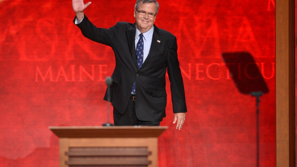 Former Republican Governor of Florida Jeb Bush waves to delegates as he takes the stage at the Republican National Convention at the Tampa Bay Times Forum in Tampa, Fla on Aug. 30, 2012.