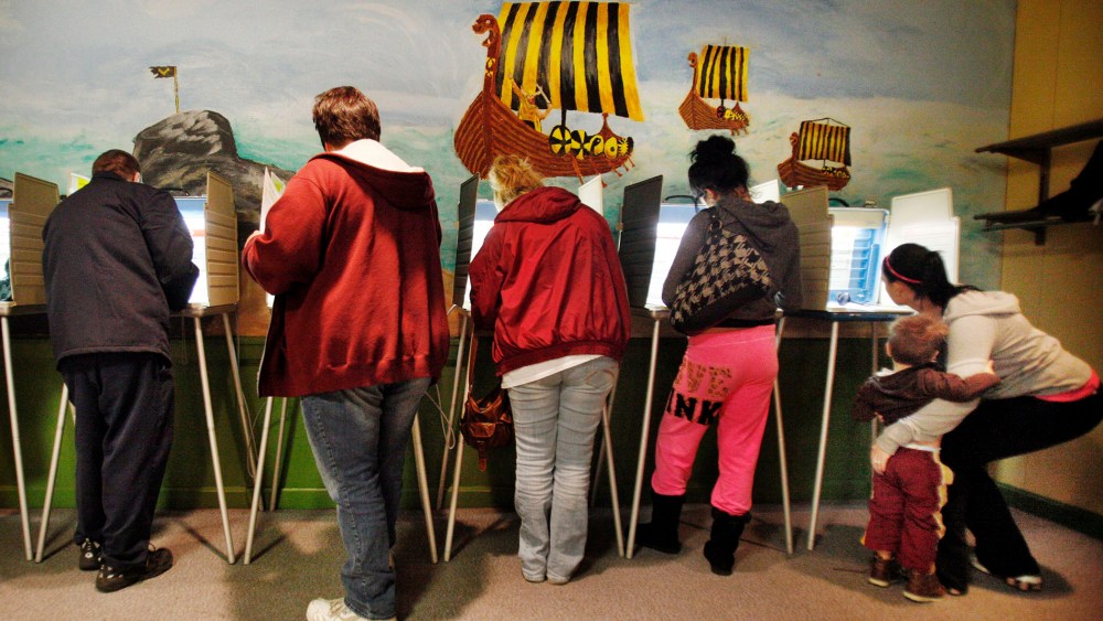 Voters cast their ballots at a polling site in Akron, Ohio, Nov. 6, 2012.