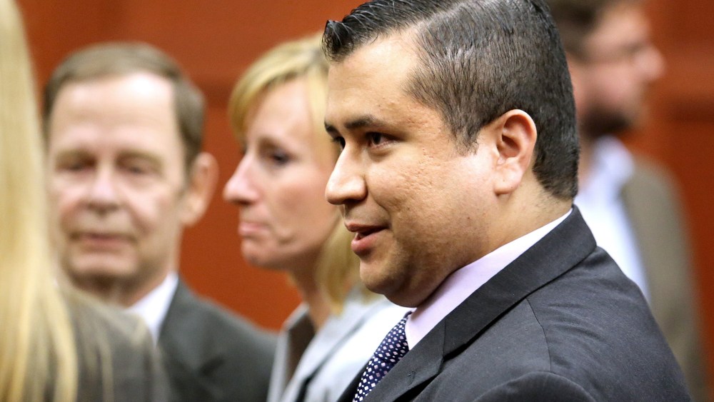 George Zimmerman leaves the courtroom after being found not guilty, on the 25th day of Zimmerman's trial at the Seminole circuit court in Sanford, Florida, July 13, 2013.