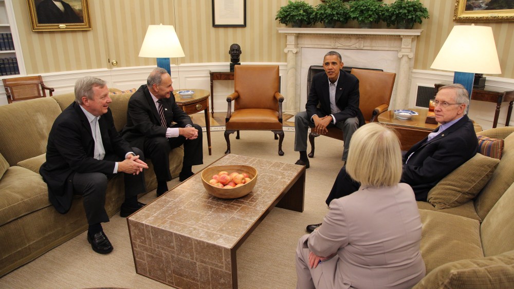 US President Barack Obama (C) meets with Senate Democratic leaders (L-R) Dick Durbin, Chuck Shumer, Harry Reid and Patty Murray, in the Oval Office in Washington DC on Oct. 12, 2013.