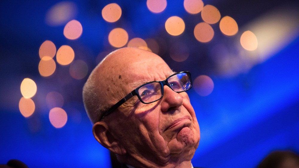 Rupert Murdoch, founder, Chairman and CEO of News Corporation, listens during an event in Washington, D.C., Nov. 19, 2013. (Photo by Drew Angerer/Pool/EPA)