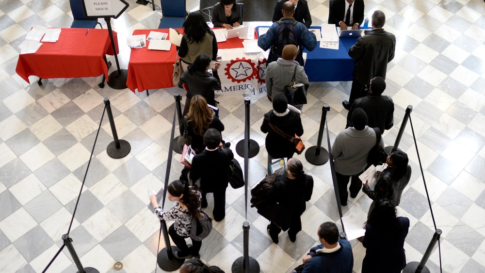Job seekers wait to speak with employers at a job fair in the Brooklyn borough of New York, N.Y., on April 11, 2014. (Photo by Andrew Gombert/EPA)